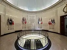 Rotunda with two black granite slabs inscribed with the names "Douglas MacArthur" and "Jean Faircloth MacArthur"