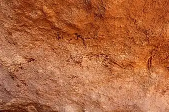 Rock painted shepherds with cattle