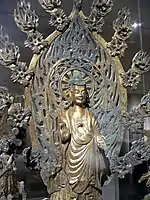 Northern Wei Buddhist bronze, 524, with two-ringed halo within a flaming mandorla