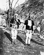 Two Upper Reka men: A man from Reč on the left and a man from Strezimir on the right.