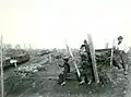 Men sit near the Manassas Junction railroad in 1862