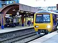 A Class 323 and the distinctive canopies