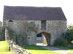 Old gatehouse/barn near the church