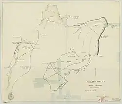 A hand-drawn map depicting Ford Island with three sections drawn in a larger scale.  Clear tape covers parts of the map.