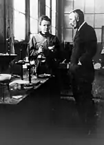 Pierre and Marie Curie in their laboratory.