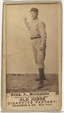 Standing man in baseball uniform