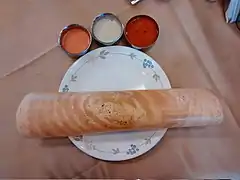 Masala dosa served traditionally with chutney, sambar, sauteed potato filling