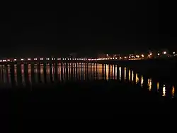 A view of the Mei River in Meizhou at night.