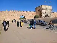 Bab al-Qasdir, a gate in the outer southeastern wall of the Kasbah; the original gate passed through the tower on the right