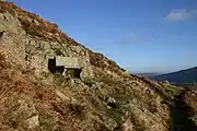 The memorial seat on Gowbarrow Fell. The inscription reads, "A thank-offering 1905"