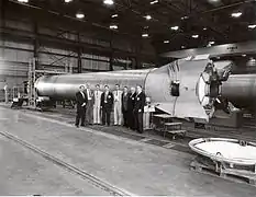 MSFC Mercury-Redstone Project Manager Joachim Kuettner (l) and center officials host MR-4 astronaut Gus Grissom (6th from l).