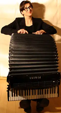 Merima Kljuco with her concert accordion in Los Angeles, February 2014.jpg