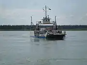 The Merv Hardie ferry in use before the bridge was opened.