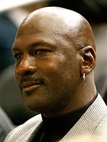 A picture of Michael Jordan wearing an earring.