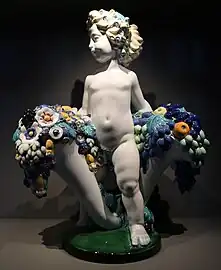 Austrian Art Nouveau - Putto with two cornucopias with floral cascades, by Michael Powolny, designed in c.1907, produced in 1912, ceramic, Kunstgewerbemuseum Berlin, Berlin, Germany