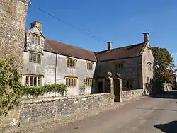 Midelney Manor, forecourt and garden walling with gate piers