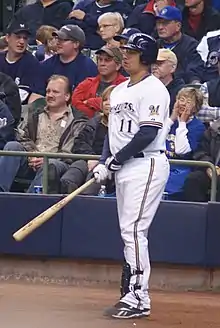 A baseball player in white