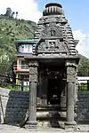 A Miniature stone shiva temple