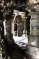 Decorative pillars and minor shrine (aedicula) inside mantapa