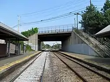 A railway station with two low-level side platforms and two tracks