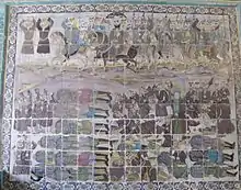 A Iranian tile-work depicting the Penitents and their leader Sulayman ibn Surad, on horses, while a faceless men is in center of a group of workers with showels