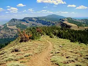 The summit trail and surrounding mountains.