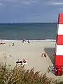 The beach is equipped with a life-guard tower