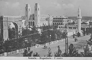 Image 56Downtown Mogadishu in 1936. Arch of Triumph Umberto to the left, Cathedral and Arba Rucun mosque to the centre-right. (from History of Somalia)