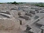 Ancient ruins, including several brick walls