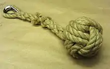 a heavy monkey's fist for throwing with an eye splice