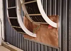 Curved wires passing through insulation