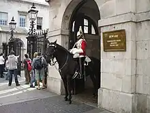 Forecourt railings, gates and guardhouses to Horse Guards