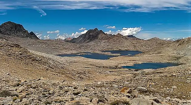 Mt. McGee centered beyond Wanda Lake. Looking northwest from Muir Pass.