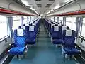 Interior of a renewed Mugunghwa carriage with space for disabled passengers.