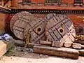 Wooden wheels of a disassembled festival cart for Bisket Jatra