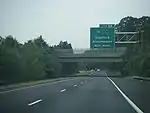 Southbound New Jersey Route 55 approaching the exit for Deptford Center Road, exit 58