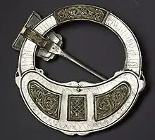 Rear of the Hunterston Brooch, an early and elaborate Irish-style brooch found in Scotland, showing a much later Viking owner's inscription