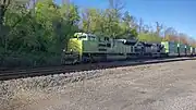 The Illinois Terminal Railroad heritage unit, EMD SD70ACe #1072, leads an eastbound intermodal on track 2