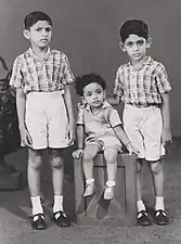 Studio photograph of boys wearing T-bar sandals in Colombo, Sri Lanka, 1964.