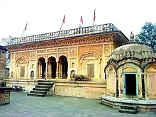 Narbadeshwar Temple including the paintings therein as well as subsidiary shrines within the compound wall