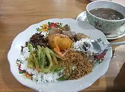 Nasi campur with buffalo soup, served in Tana Toraja, South Sulawesi