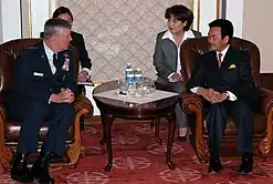 Chairman of the Joint Chiefs of Staff General Richard B. Myers with Mongolian President Natsagyiyn Bagabandi at Monoglian Government Palace during a visit to Ulaanbaatar, Mongolia on 13 January 2004.