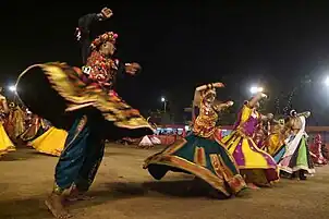 Man on the left in jama and chorno (jama/suruwal)