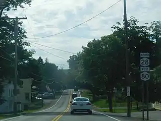 NY 28 and NY 80 passing west through Fly Creek