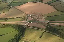 An aerial image of the flyover viaduct crossing another railway line