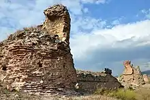 Ruins of stone walls.