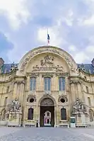 The northern portal of the complex, with Louis XIV with horse on the pediment