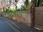 Street wall and gateway to north of Red House