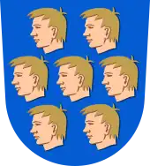 A seven human heads in the coat of arms of Nurmijärvi