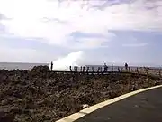 Geyser-like sea wave at one of two islets in Nusa dua